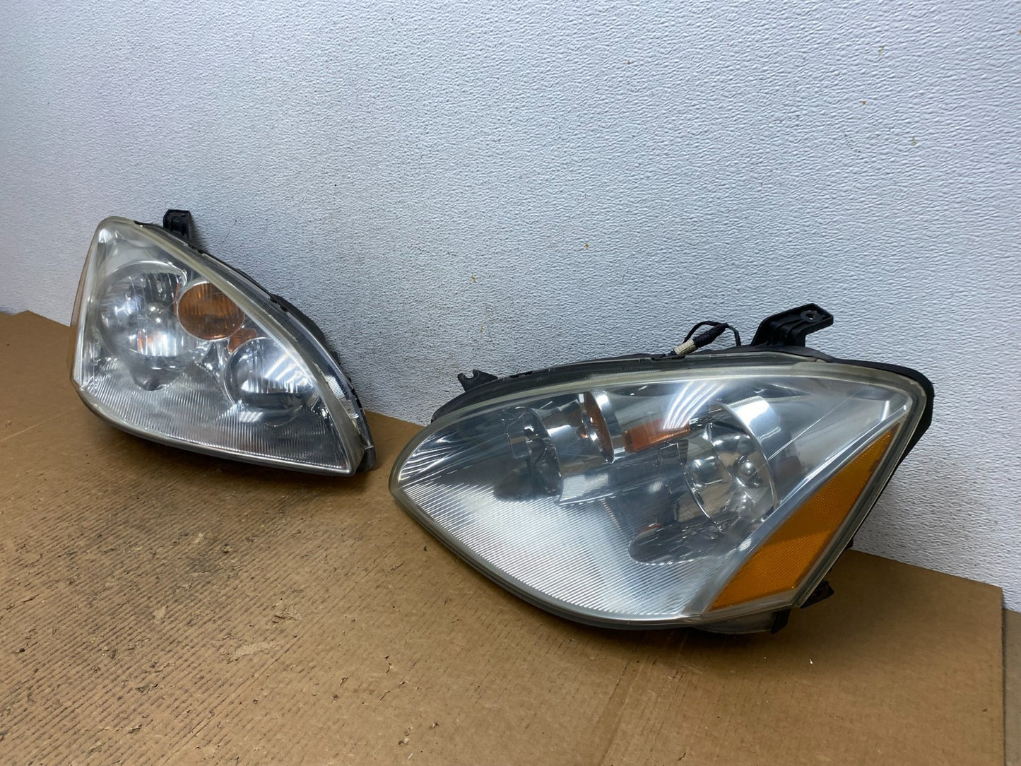 2002 to 2004 Nissan Altima Left+Right Side Set Halogen Headlights AE1613 DW1