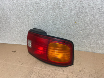 1992 to 1995 Mazda Protege Right Passenger Side Tail Light OEM Y3252 DW1