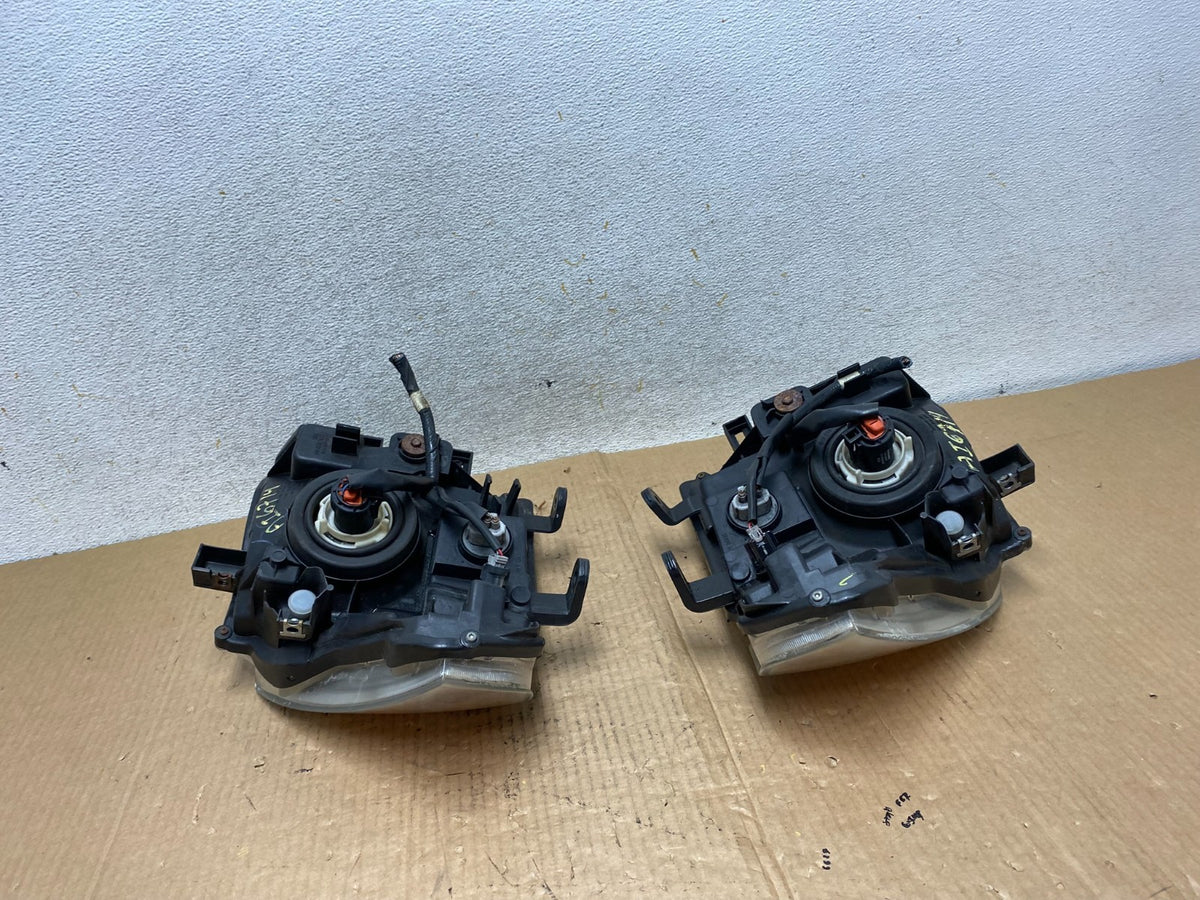 2005 2006 2007 Nissan Pathfinder Halogen Headlights Left+Right AI6714 DW11