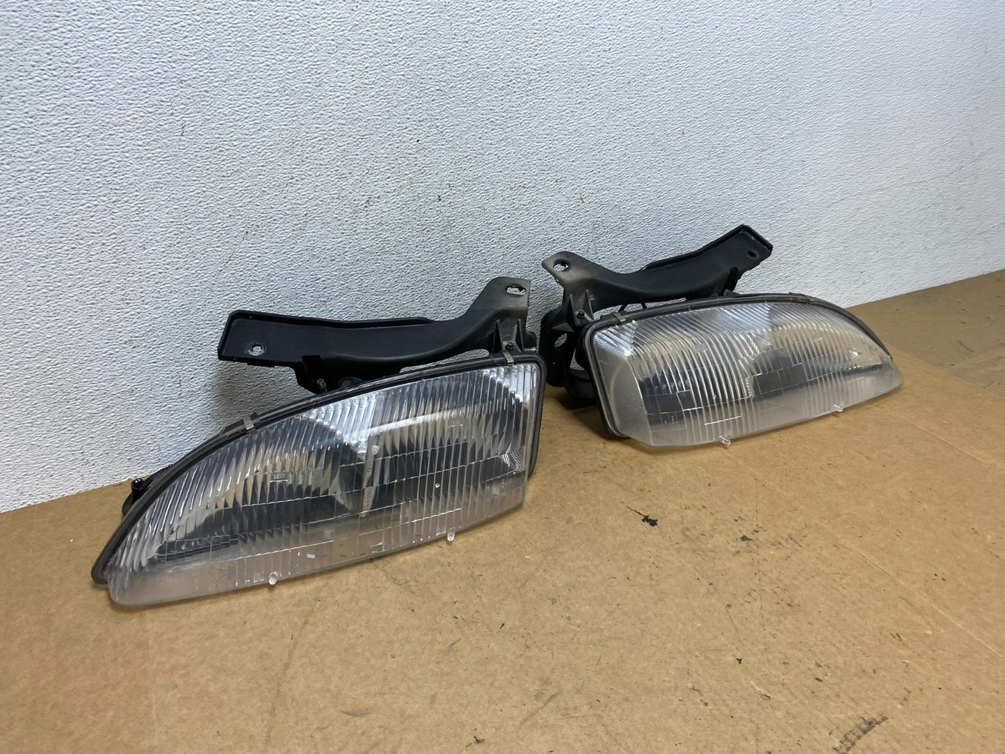 1995 to 1999 Chevrolet Cavalier Left+Right Set Halogen Headlight AE3227 DG2