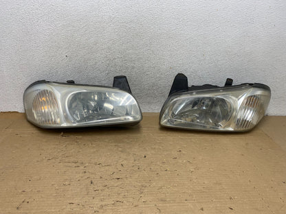 2000 to 2001 Nissan Maxima Left + Right Set Halogen Headlights AG8322 DW0