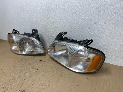 2001 2002 2003 2004 Mazda Tribute Left+Right Side Set Headlights AE9806 DW1