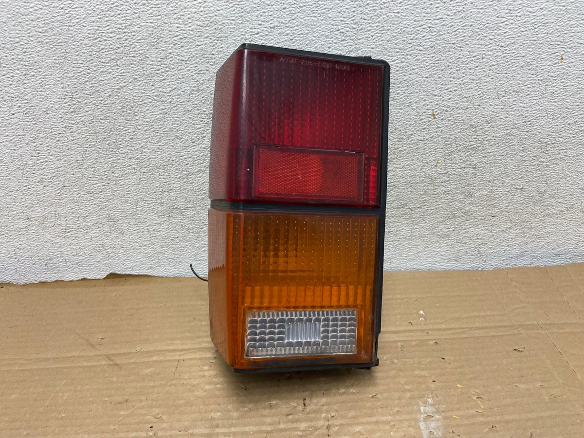 1984 to 1996 Jeep Cherokee Left Driver LH Side Tail Light AG9070 LK0