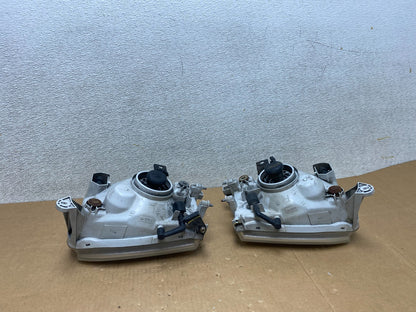 1999-2004 Nissan Pathfinder Left+Right Side Set Halogen Headlights V4820 DW10