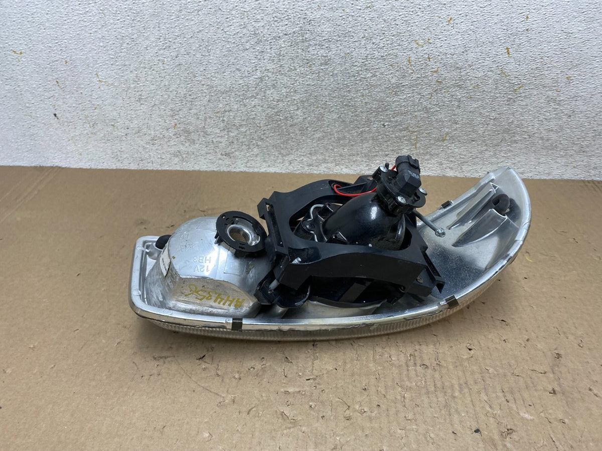 1999 - 2006 GMC Sierra Left Driver LH Halogen Headlight AJ2313 DW5