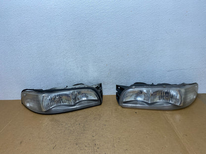 1997 to 1999 Buick Lesabre Left+Right Halogen Headlights AE0596 DW0