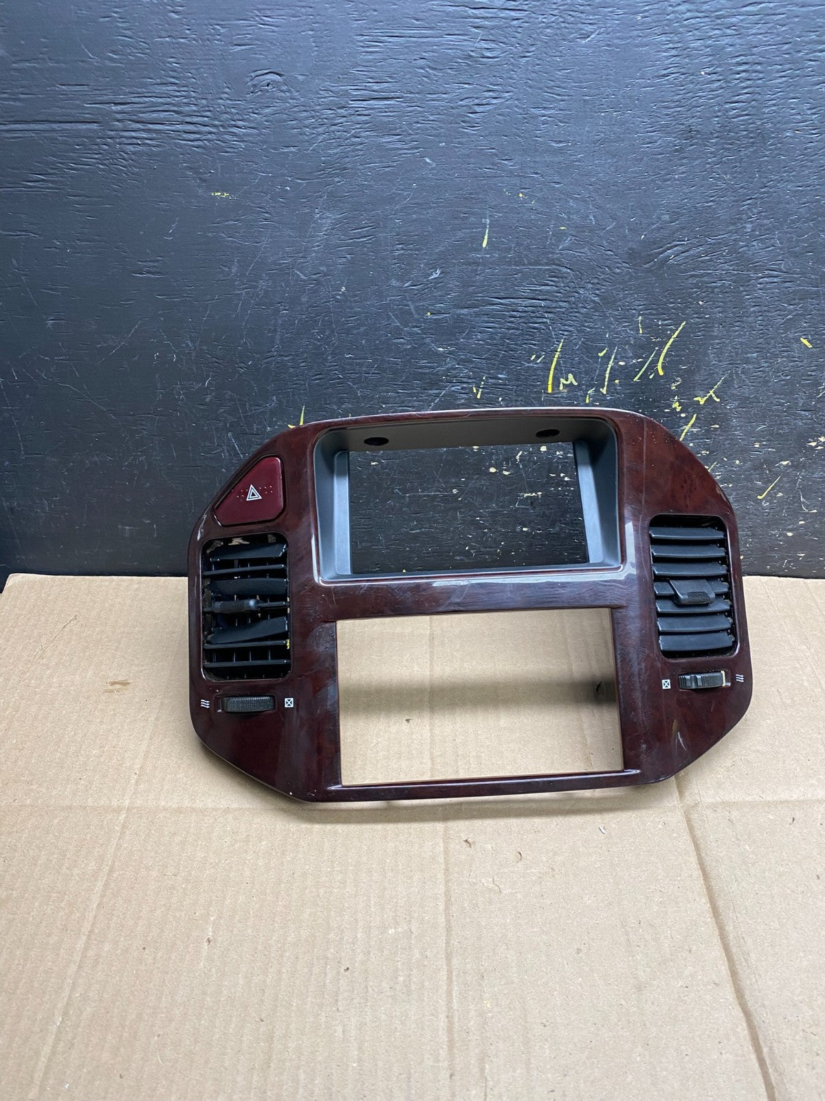 2000 to 2006 Mitsubishi Montero Dash Radio Climate Control Bezel  OEM aa4575 DG0