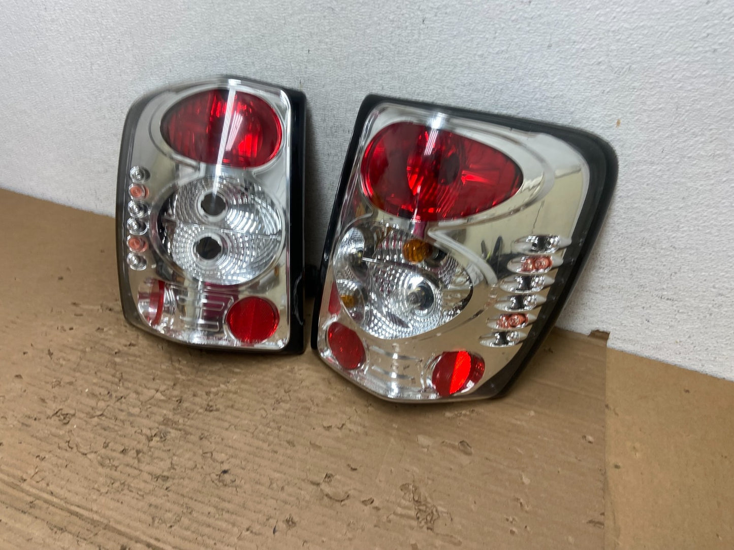 1999-2004 Jeep Grand Cherokee Left + Right Set Chrome Tail Lights AD4367 DG1