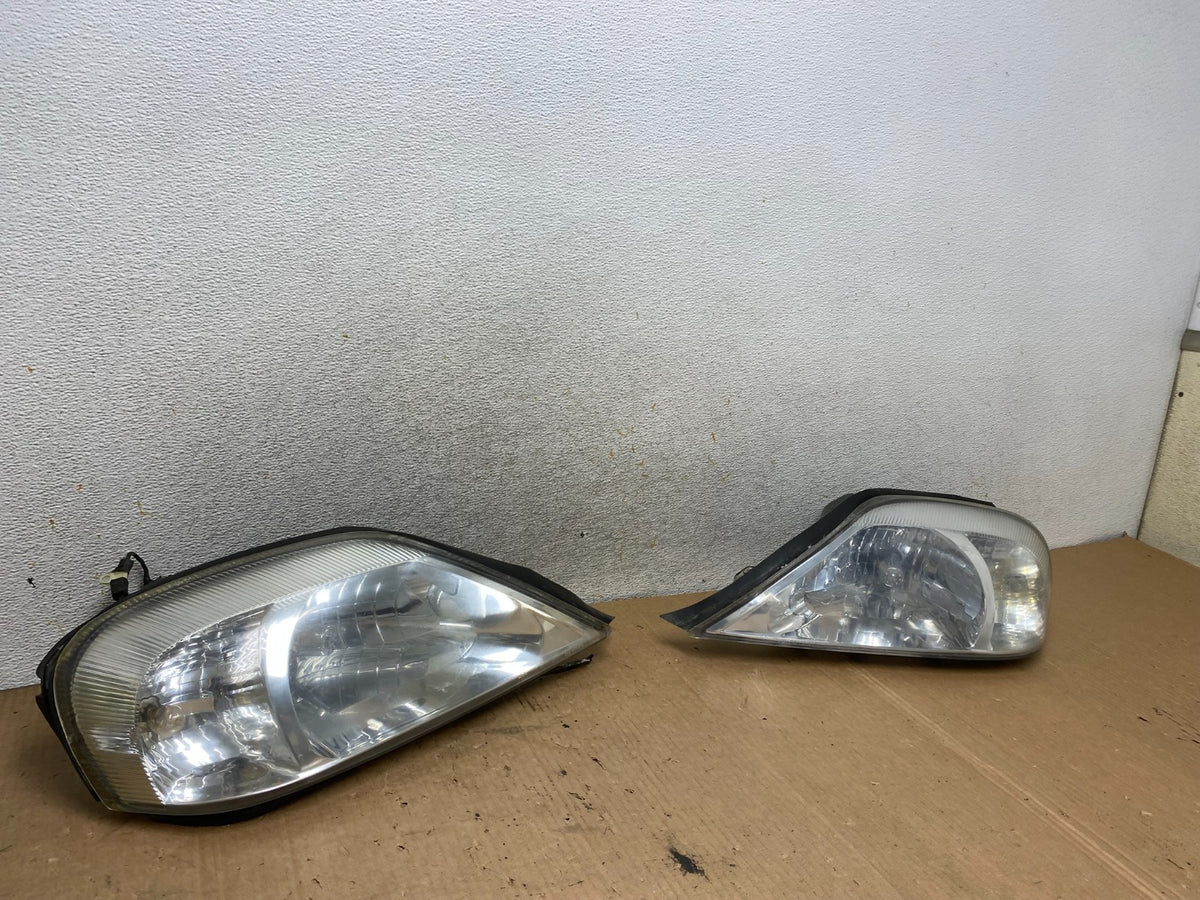 2000 to 2005 Mercury Sable Left+Right Side Halogen Headlights AI8874 DW2