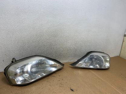 2000 to 2005 Mercury Sable Left+Right Side Halogen Headlights AI8874 DW2