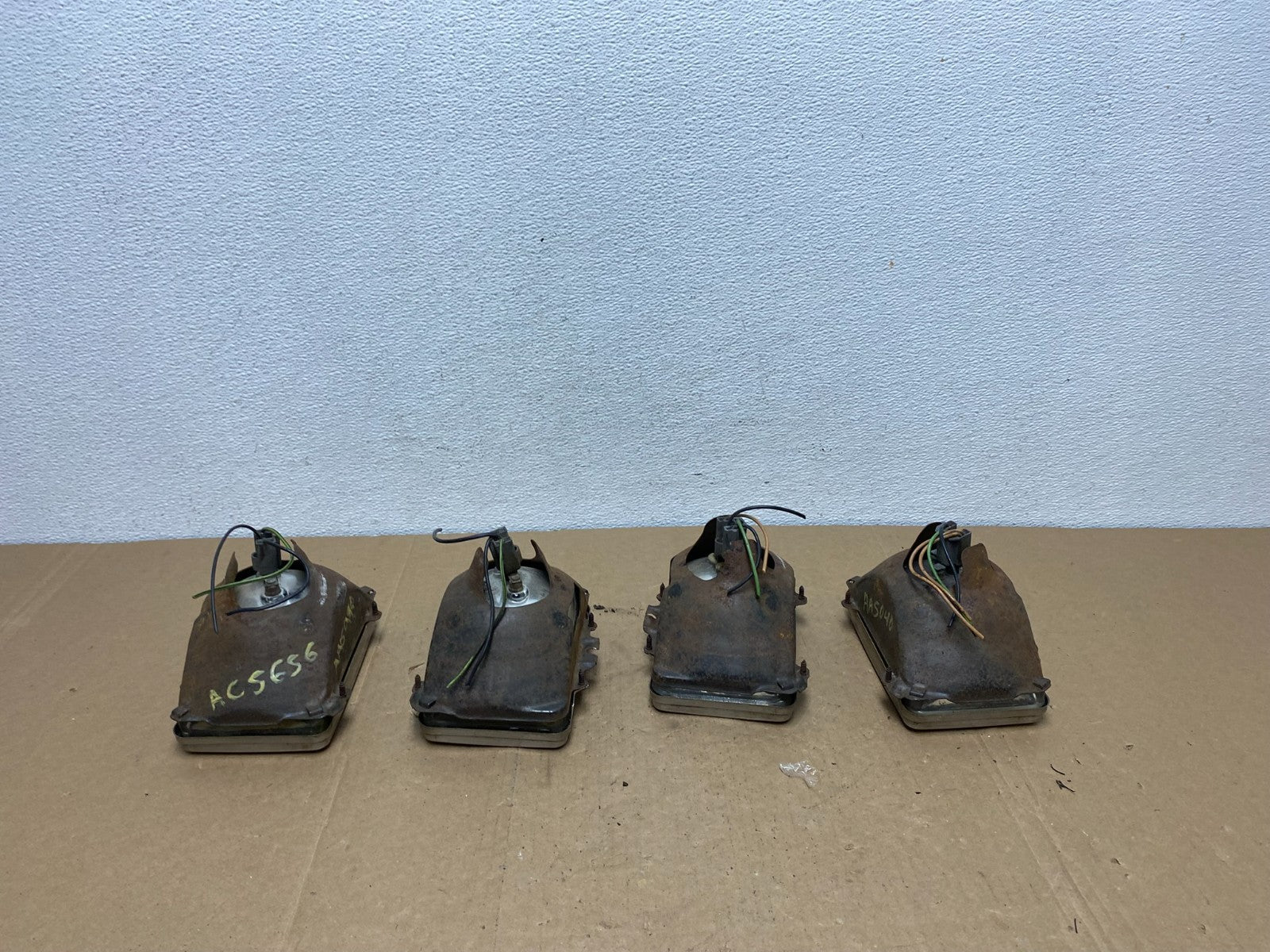 1984 to 1985 Pontiac Sunbird Left+Right Side Headlights AC56565