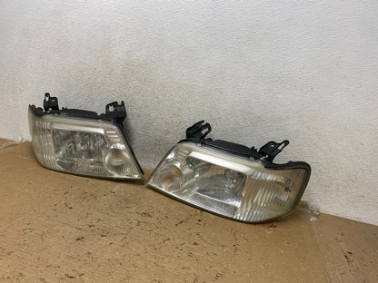 2005 to 2007 Mercury Mariner Left+Right Side Halogen Headlights AH9268 DW2