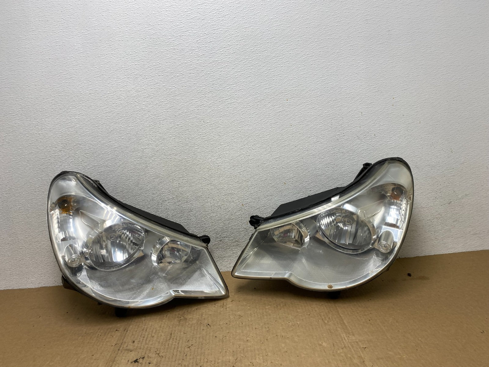 2007 to 2010 Chrysler Sebring Left+Right Side Headlights AF9867 DW0