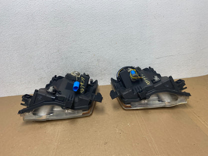 2005-2015 Nissan Xterra Driver Left+Right Side Set Headlights AD7934 DW9