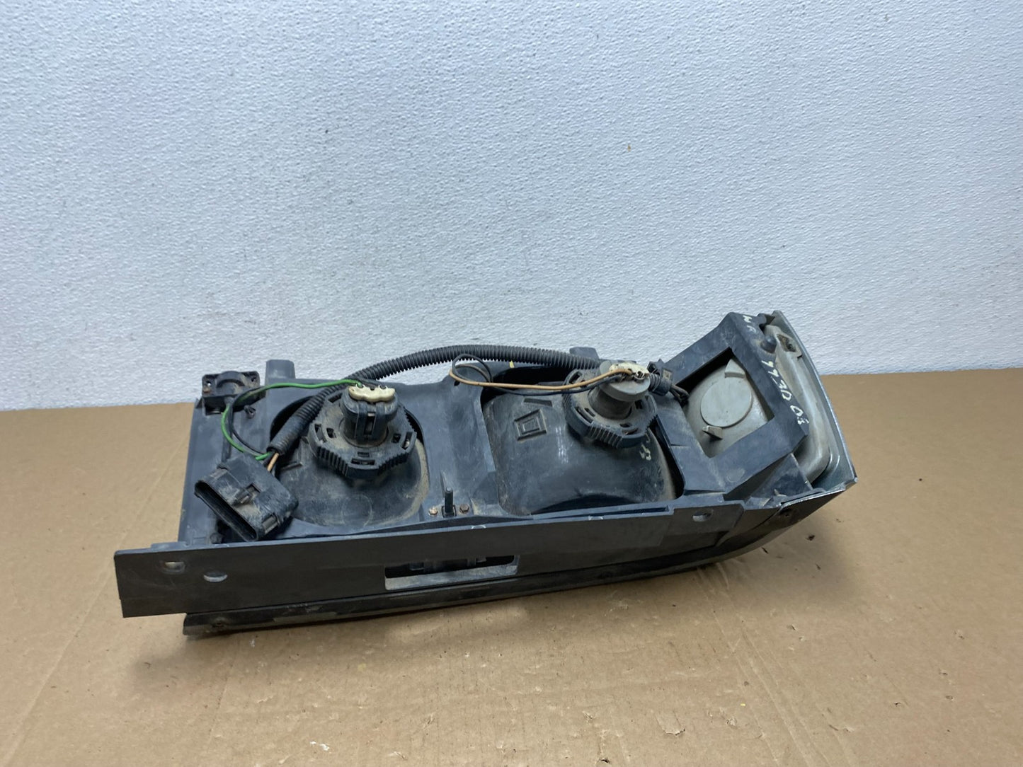 1987 to 1990 Buick Electra Left Driver Side Headlight AC56444