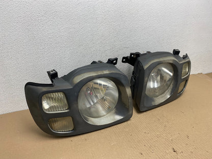2002 2003 2004 Nissan Xterra Left+Right Side Headlights AE7223 DW2