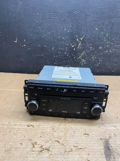 2007-2012 Chrysler Dodge Jeep Ram Radio CD MP3 AUX Receiver W9771 DG0