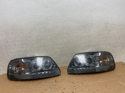 1997 to 2003 Ford F150 Left+Right Set Side Headlights Z3177 DG0