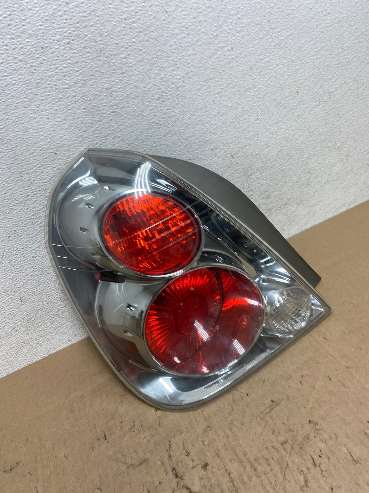 2005 to 2006 Nissan Altima Left Driver Side Tail Light AE6534 LK2