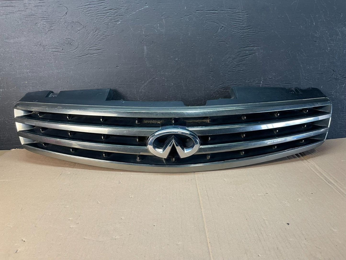 2005 to 2006 Infiniti G35 Sedan Front Upper Grille with Emblem AD8388 DG0