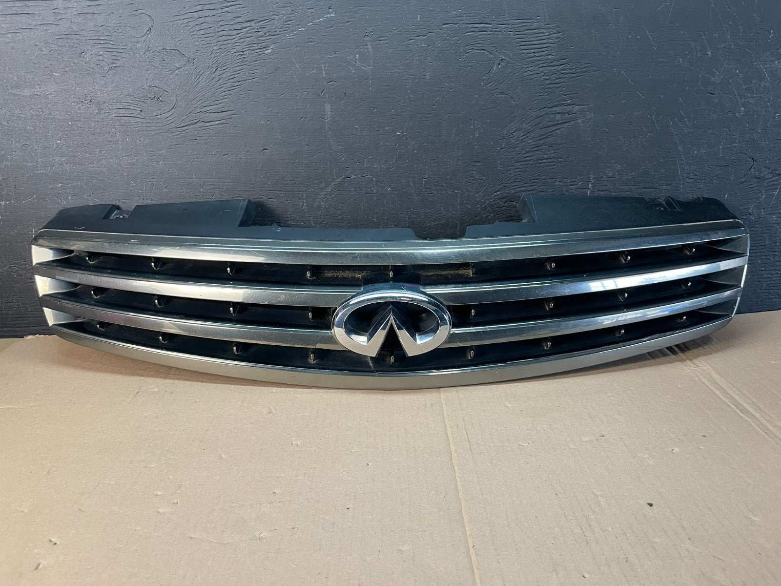 2005 to 2006 Infiniti G35 Sedan Front Upper Grille with Emblem AD8388 DG0