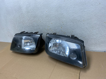 2002 to 2004 Volkswagen Jetta Left+Right Headlights AI1146 DW1