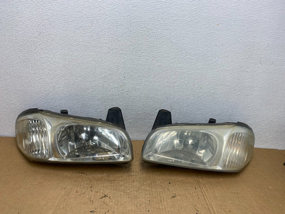 2000 to 2001 Nissan Maxima Left+Right Side Set Halogen Headlights AC7705 DW0