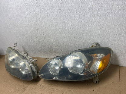 2005 to 2008 Toyota Corolla Black Left+Right Side Set Headlights AG4893 DW2