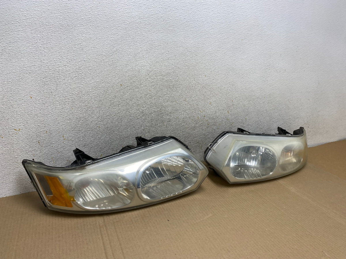 2003 to 2007 Saturn Ion Halogen Headlights Left+Right Side AI9435 LK2