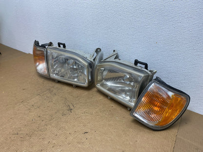 1999-2004 Nissan Pathfinder Left+Right Side Set Halogen Headlights Oem AC3302 DW1