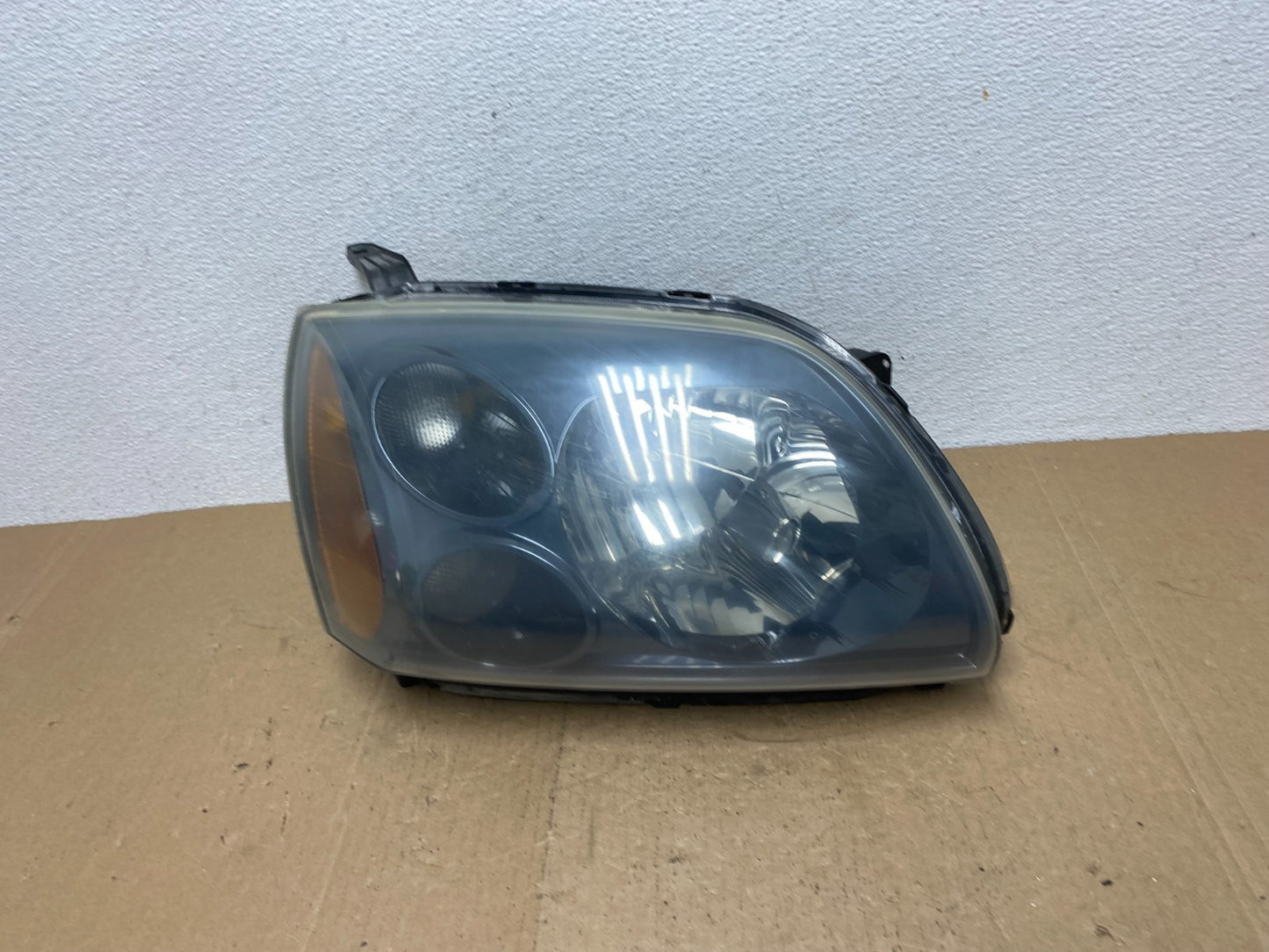 2004 to 2009 Mitsubishi Galant Right Passenger Headlight Black Halogen AC5752 DW0