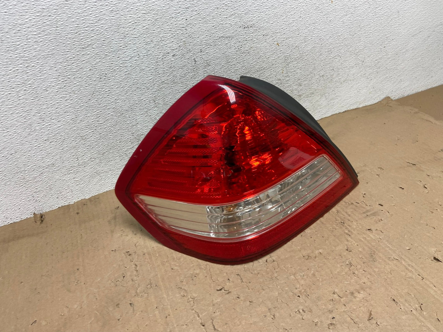 2007-2012 Nissan Versa Sedan Left Driver Lh Tail Light AE9392 LK2
