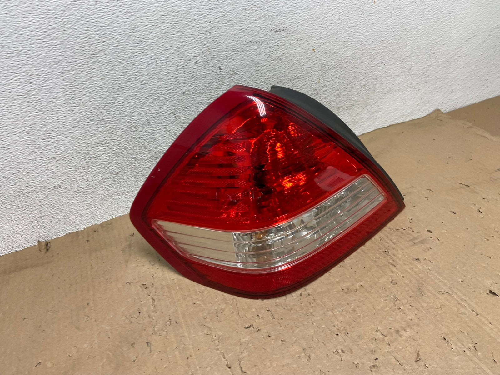 2007-2012 Nissan Versa Sedan Left Driver Lh Tail Light AE9392 LK2