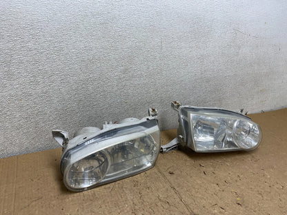 2001-2002 Toyota Corolla Left+Right Side Halogen Headlights V3834 DW2