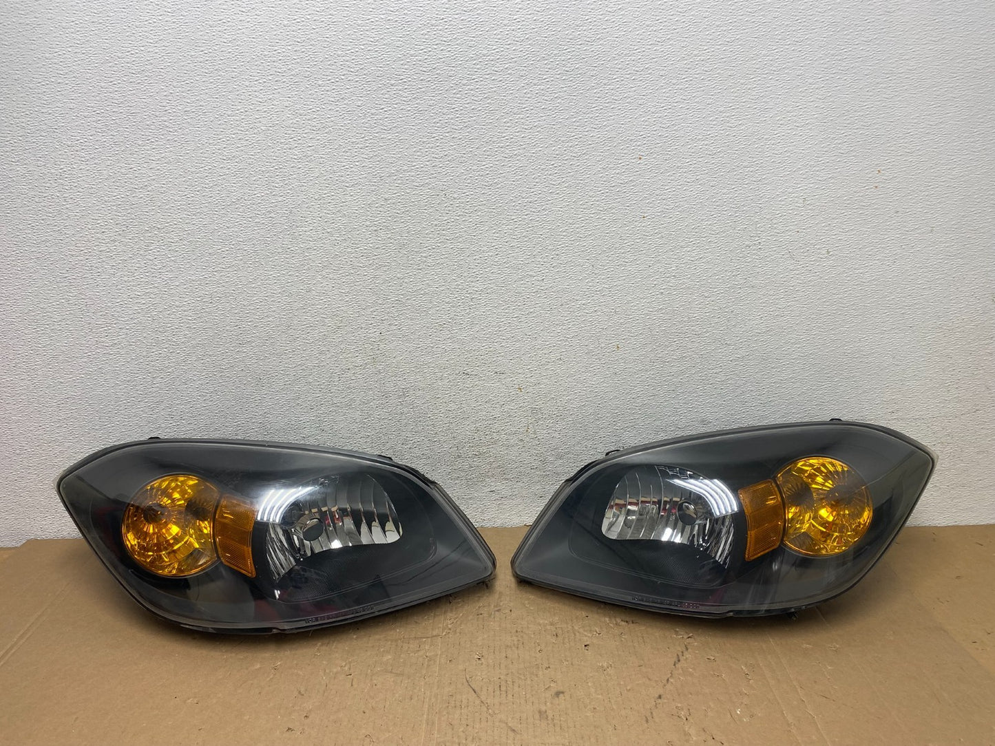 2005 - 2010 Chevrolet Cobalt Sedan Left+Right Set Headlights AD8035 DW0