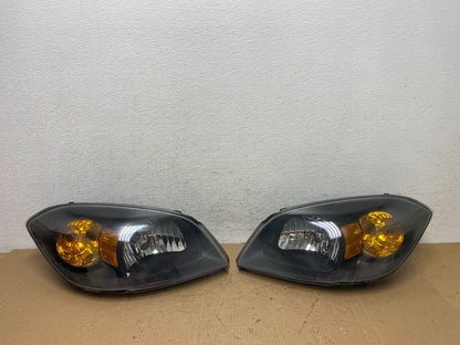 2005 - 2010 Chevrolet Cobalt Sedan Left+Right Set Headlights AD8035 DW0