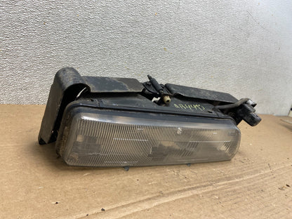 1989 to 1992 Pontiac Sunbird Right Passenger Side Headlight 16509426 AB44982