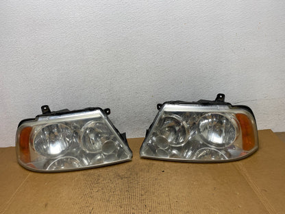 Halogen 2003-2006 Lincoln Navigator Left+Right Side Headlights AE0384 DW0