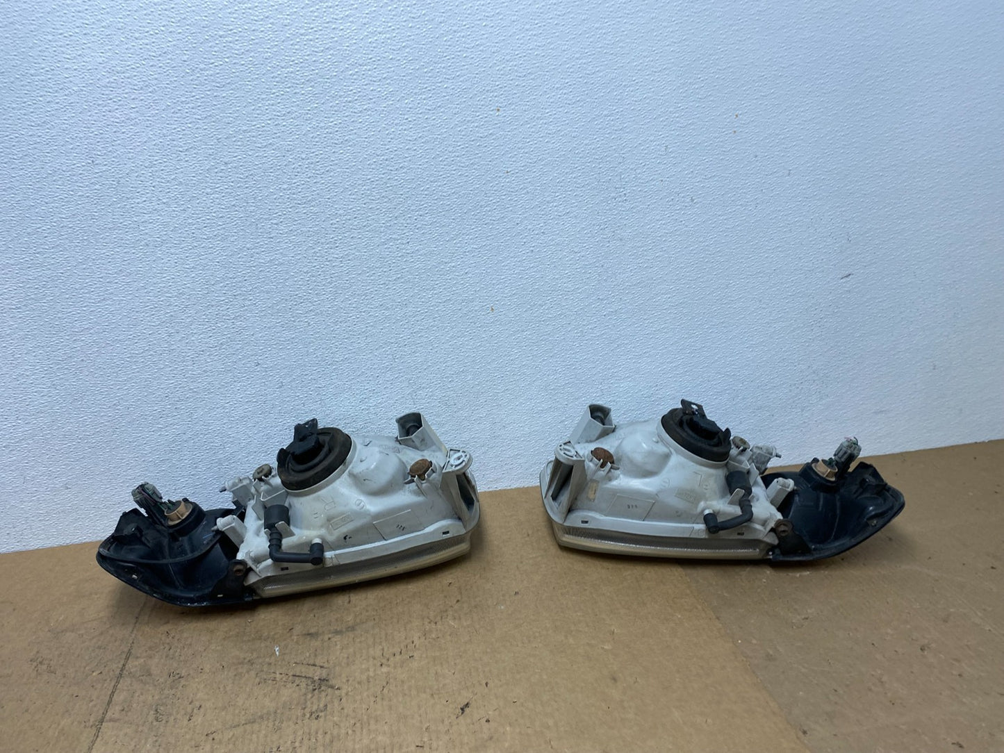 1999-2004 Nissan Pathfinder Left+Right Side Set Halogen Headlights Oem AC3428 DW6