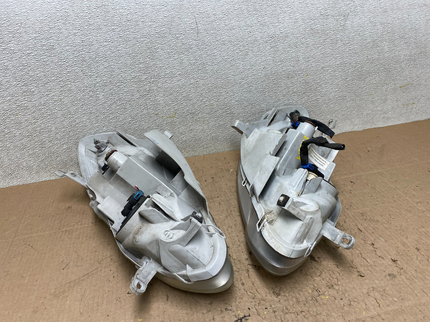 2003 to 2004 Toyota Corolla Left+Right Side Set Headlights W2743 DW5