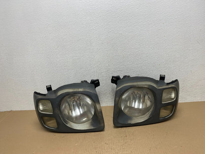 2002 2003 2004 Nissan Xterra Left+Right Side Headlights AE7223 DW0