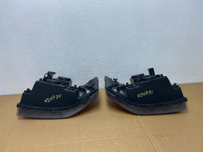 2002 to 2009 Gmc Envoy Left+Right Set Black Headlights Halogen AD0730 DW7