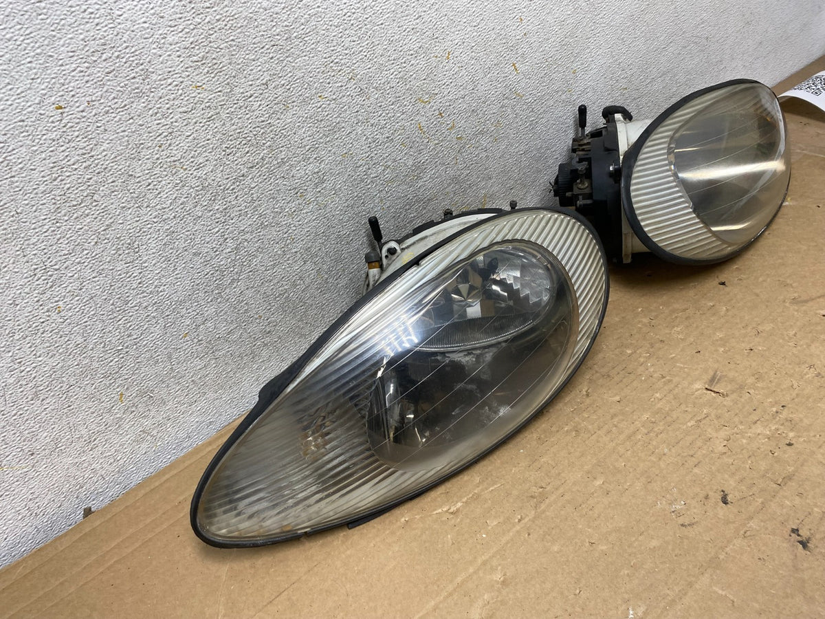 1996 to 1999 Mercury Sable Left+Right Side Set Halogen Headlights AH8393 DW2