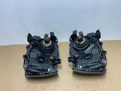 2002 2003 2004 Nissan Xterra Left+Right Side Headlights AC6020 DW10