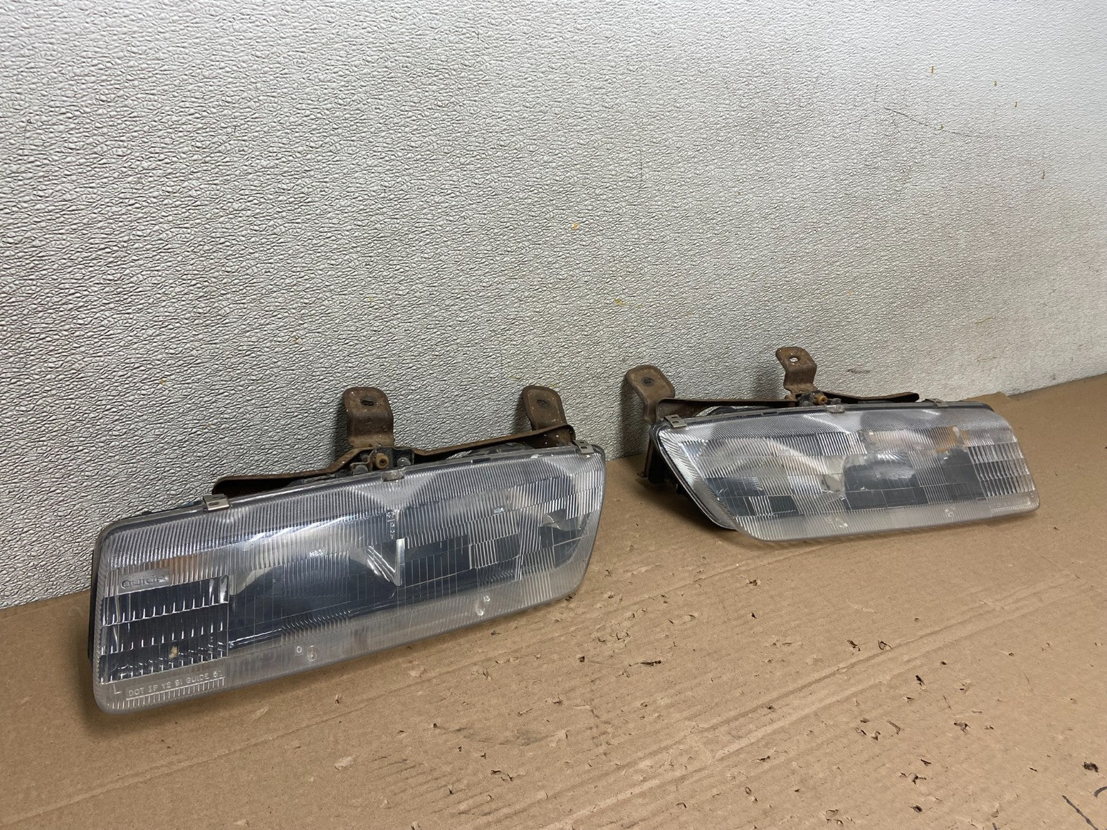 1991 to 1996 Saturn S Series Coupe Left Driver Side Headlights AB13862