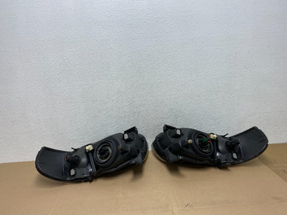 2004 - 2006 Nissan Sentra Halogen Left+Right Headlights AE6630 DW8