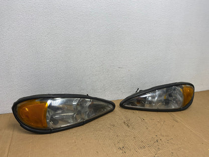 1999 to 2005 Pontiac Grand Am Left+Right Set Headlights AD1184 DG2