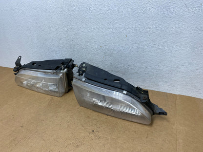 1993 to 1997 Toyota Corolla Left+Right Side Headlights AE3065 DW1