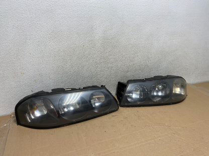 2000 to 2005 Chevrolet Impala Left+Right Set Headlights Halogen AH9380 DW2