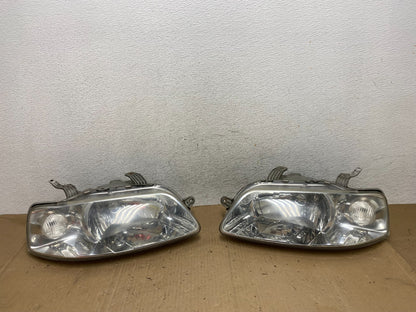 2004 - 2006 Chevrolet Aveo Hatchback Left+Right Headlights Halogen AE9159 DW0